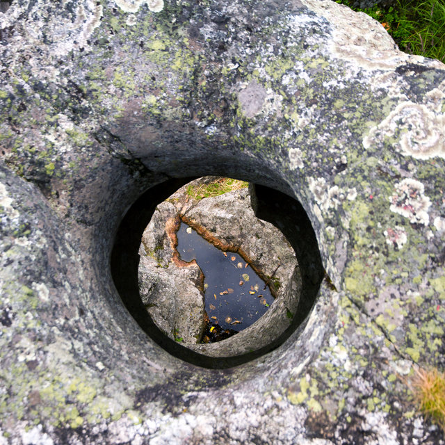 Hole in the rock formed by the former whitewater rapids of Döda fallet. 