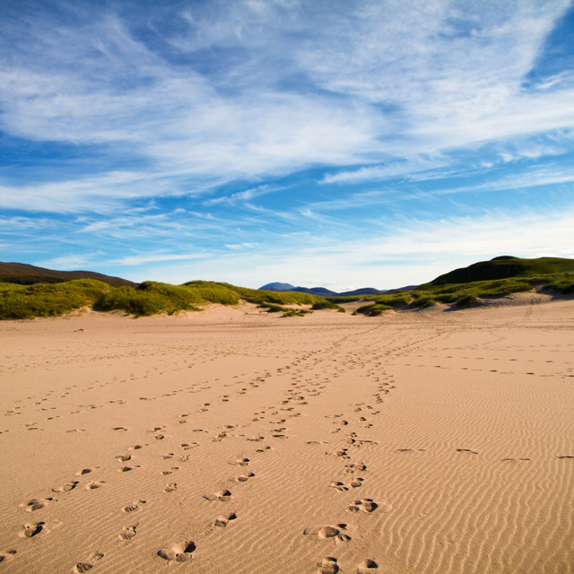 Footprints on Sandwood Bay beach.