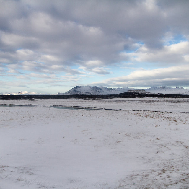 View towards Snæfellsnes peninsula. The Eldborg crater can be seen in the foreground on the right.  